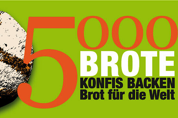 Bild zeigt den Schriftzug 5000 Brote und ein Stück von einem Brot